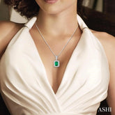 6x4 MM Emerald Shape Emerald and 1/5 Ctw Round Cut Diamond Pendant in 14K White Gold with Chain